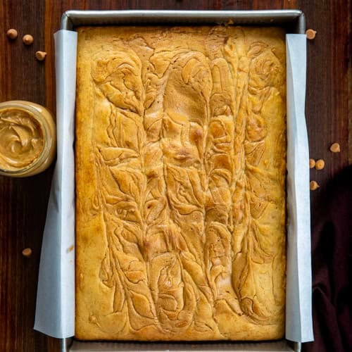 Peanut Butter Sheet Cake on a wooden table from overhead.