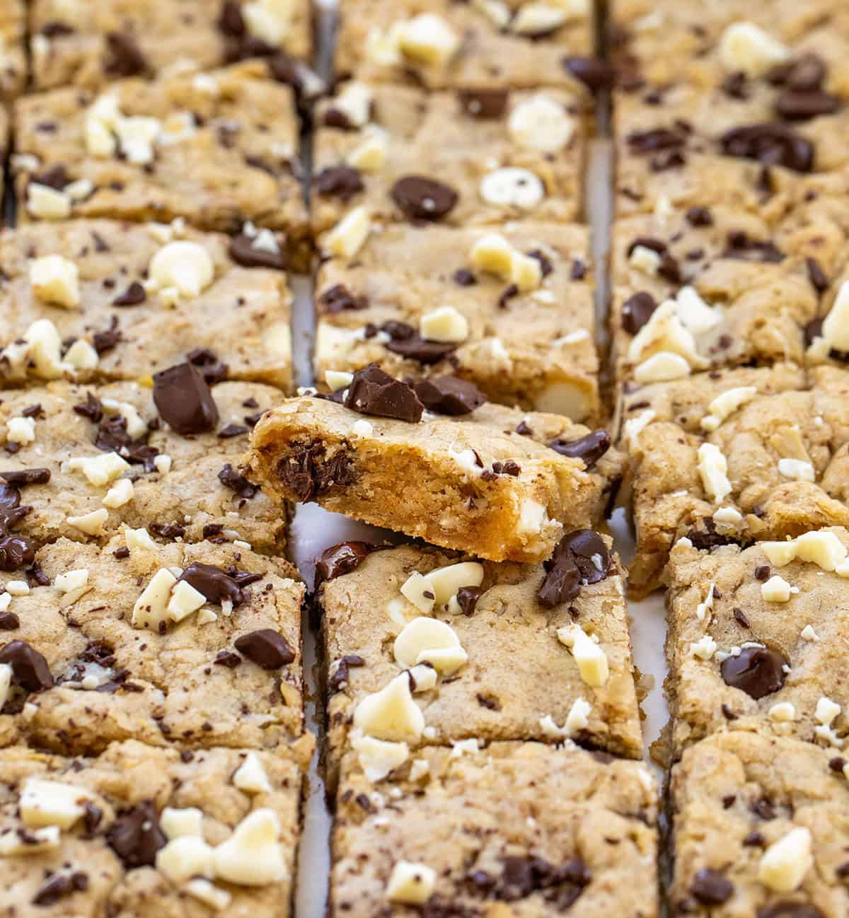 Sheet Pan Marry Me Cookies cut into squares with the center bar on its side Sheet Pan Marry Me Cookies cut into squares with the center bar on its side.