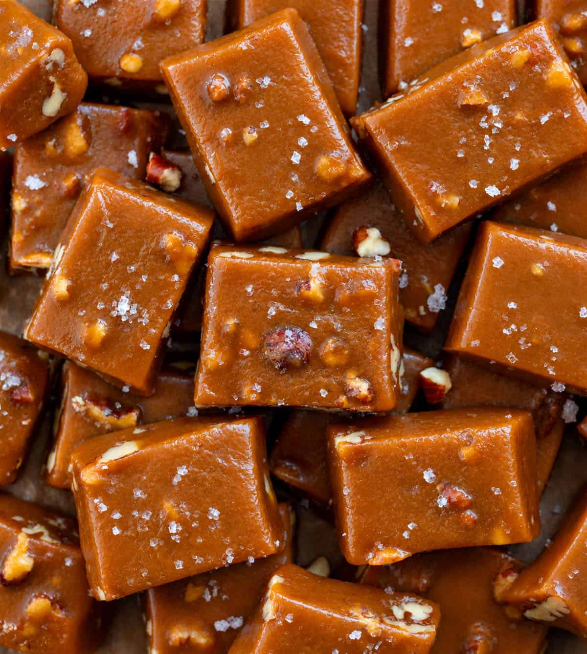 Close up of Soft Salted Pecan Caramels squares.