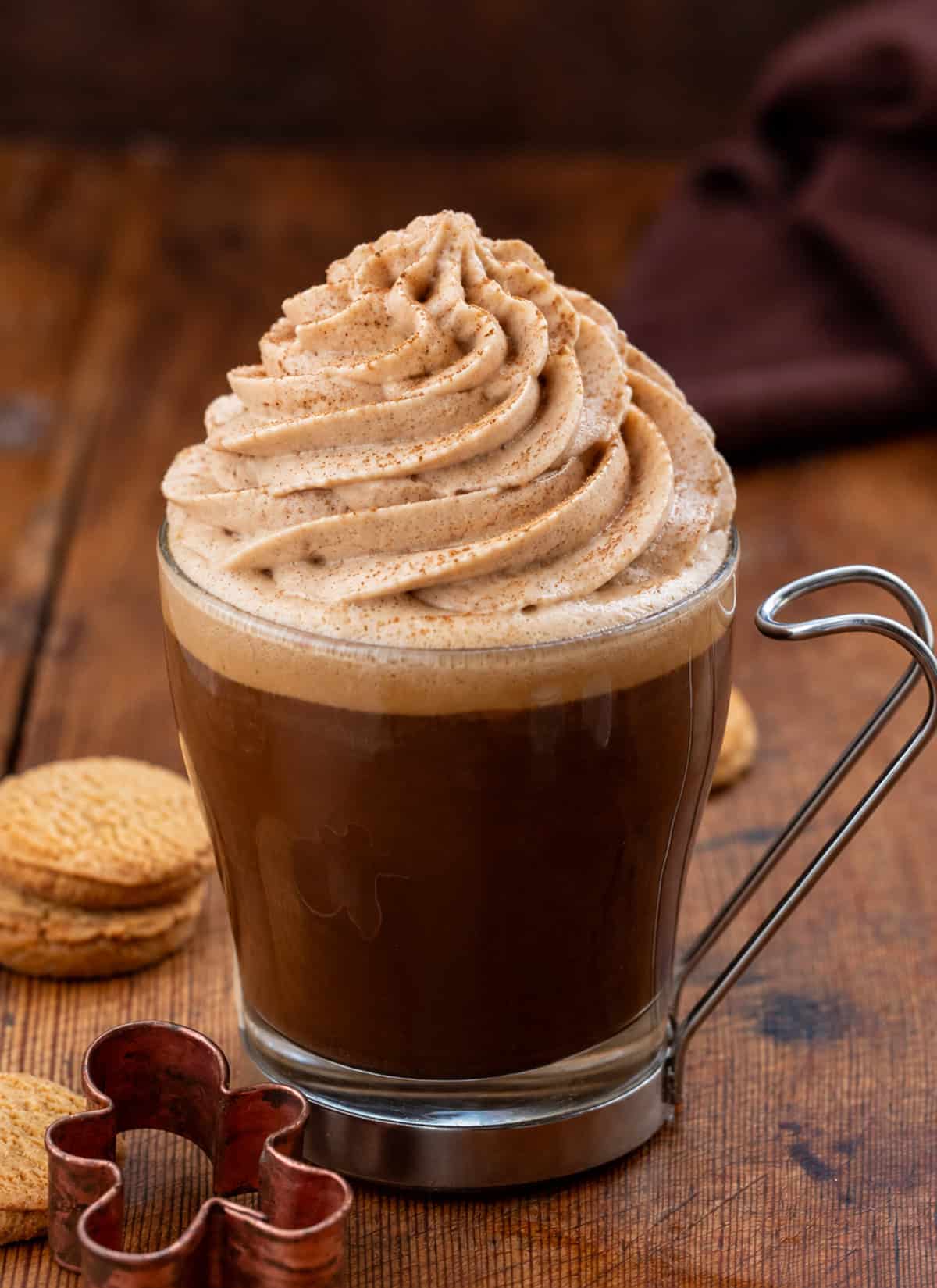 Hot cocoa with Gingerbread Stabilized Whipped Cream piped on top.