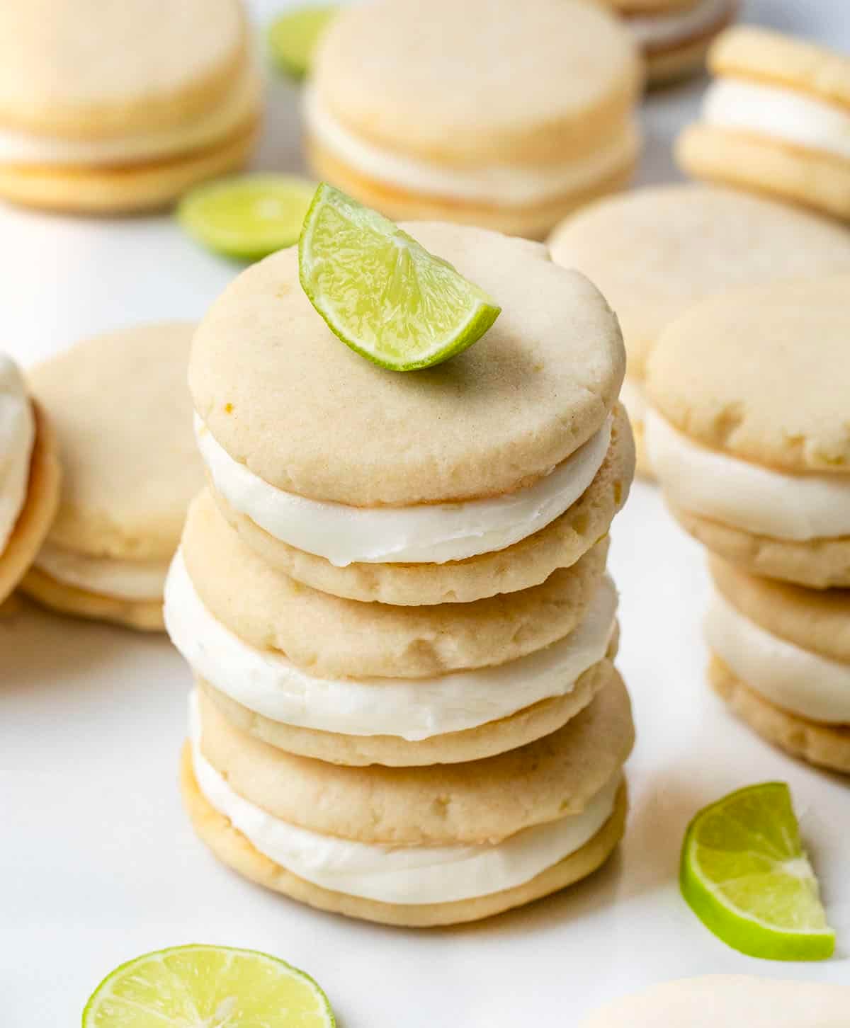 Stack of Key Lime Sandwich Cookies surrounded by more cookies.
