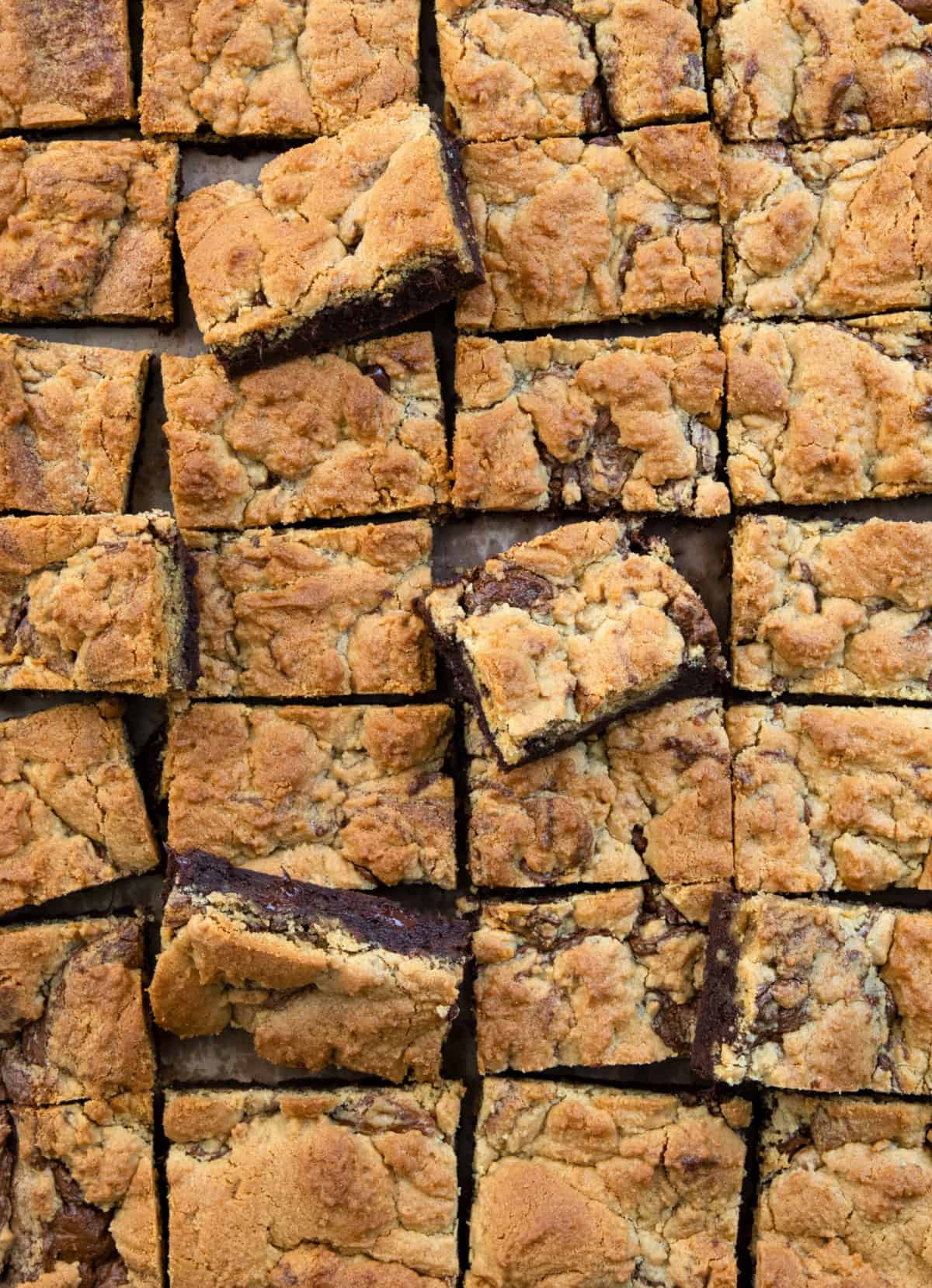 Peanut Butter Brookies cut into squares with some on their sides from overhead Peanut Butter Brookies cut into squares with some on their sides from overhead.