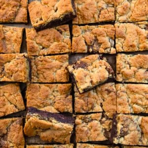 Peanut Butter Brookies cut into squares with some on their sides from overhead.