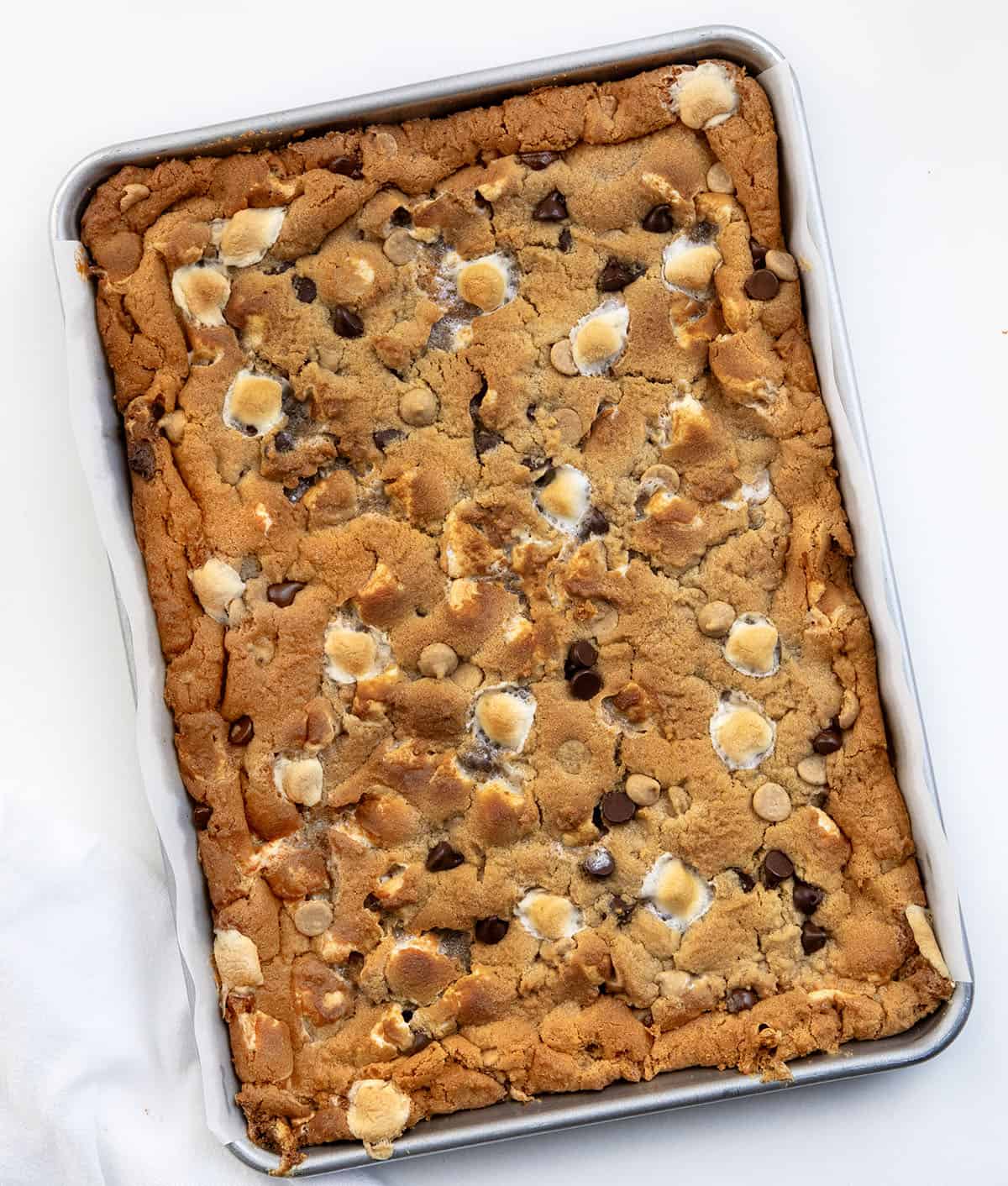 Sheet Pan Peanut Butter Marshmallow Cookies on a white table.