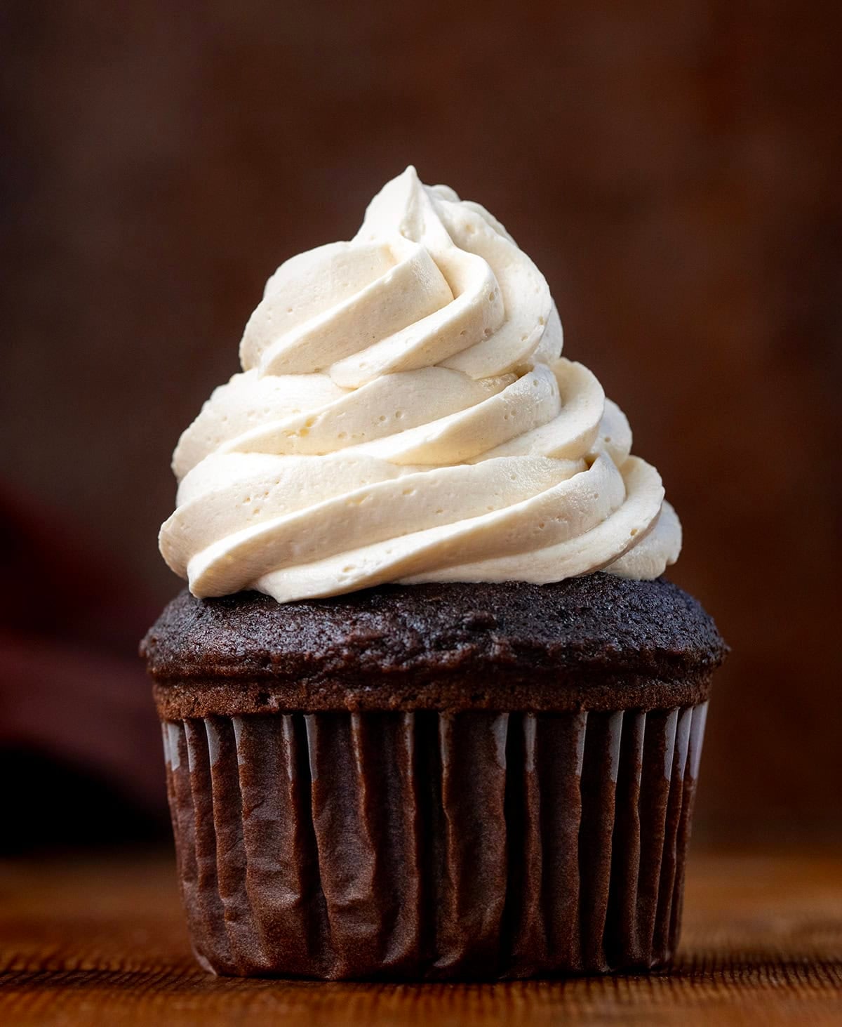 Chocolate cupcake with Maple Ermine Frosting piped on top Chocolate cupcake with Maple Ermine Frosting piped on top.