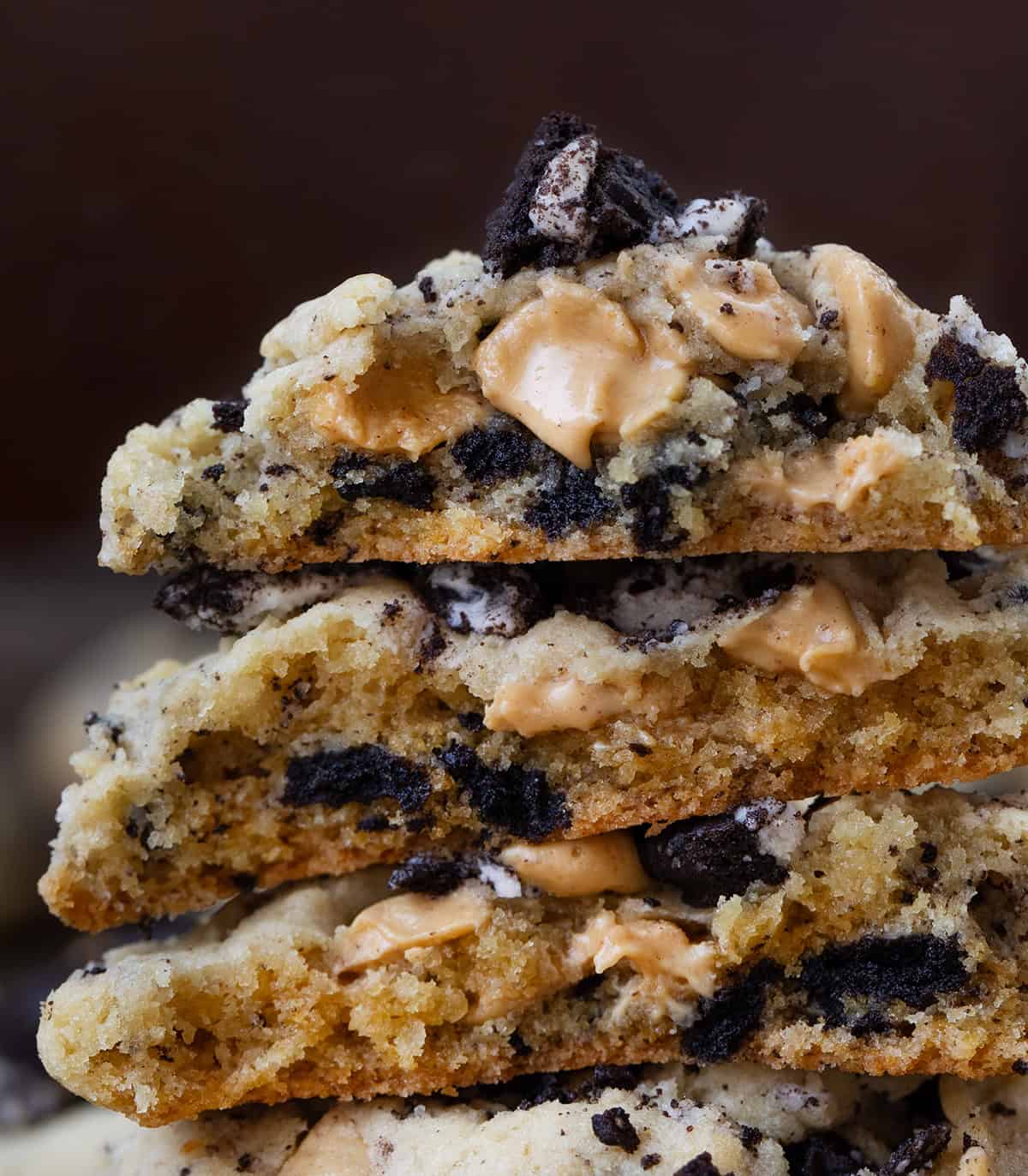 Close up of halved Peanut Butter Oreo Cookies showing the inside texture.