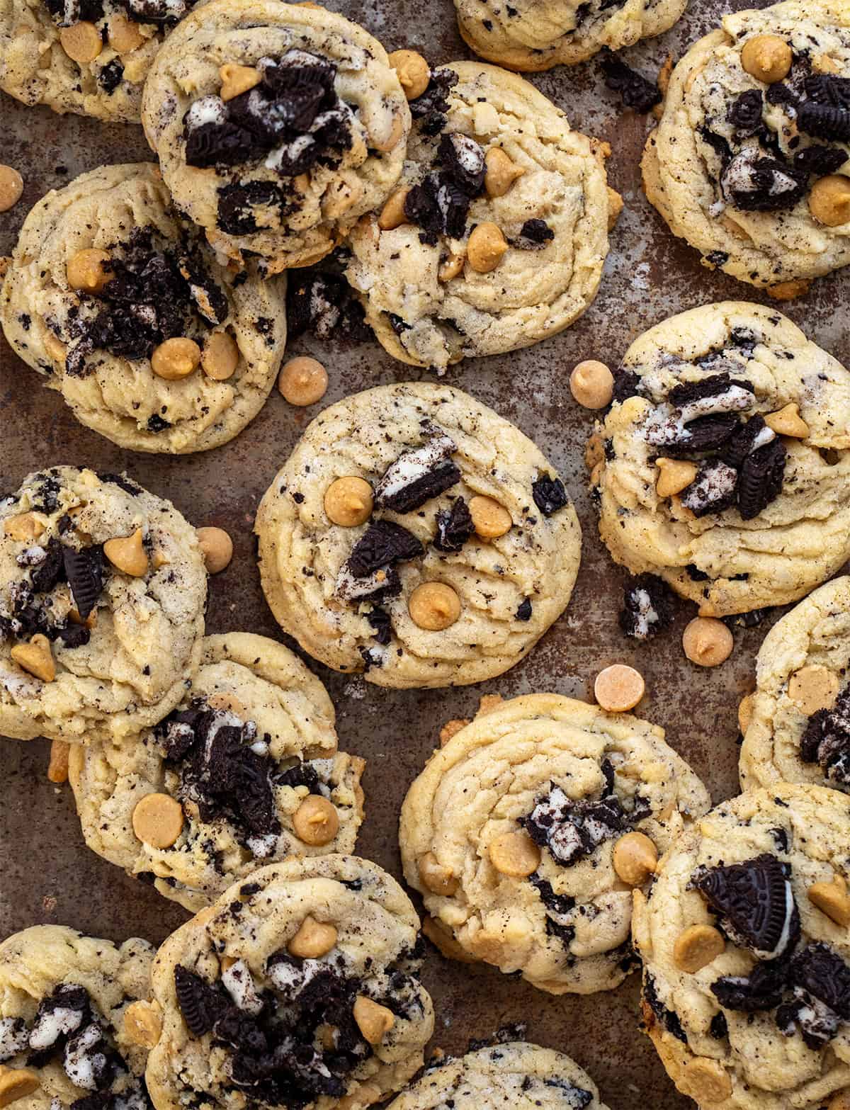 Peanut Butter Oreo Cookies on a table from overhead with oreo pieces and peanut butter morsels.