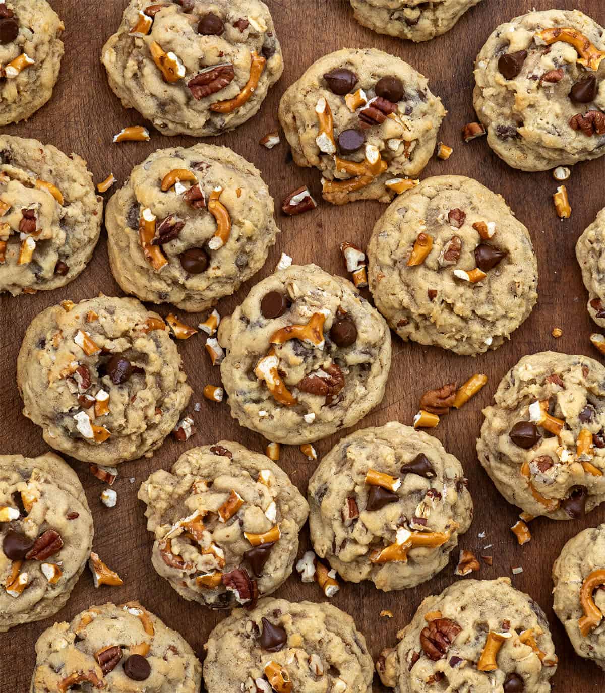 Brown Sugar Cowboy Cookies laid on top of a wooden table from overhead.