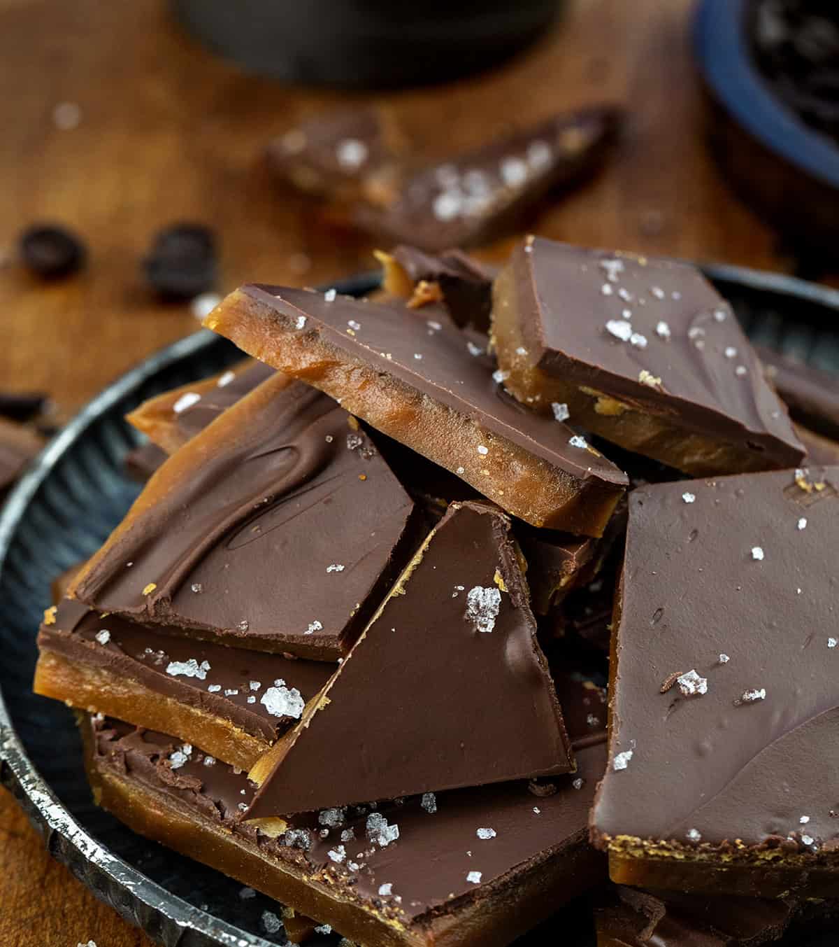 Close up of Coffee Toffee broken and stacked on a platter.