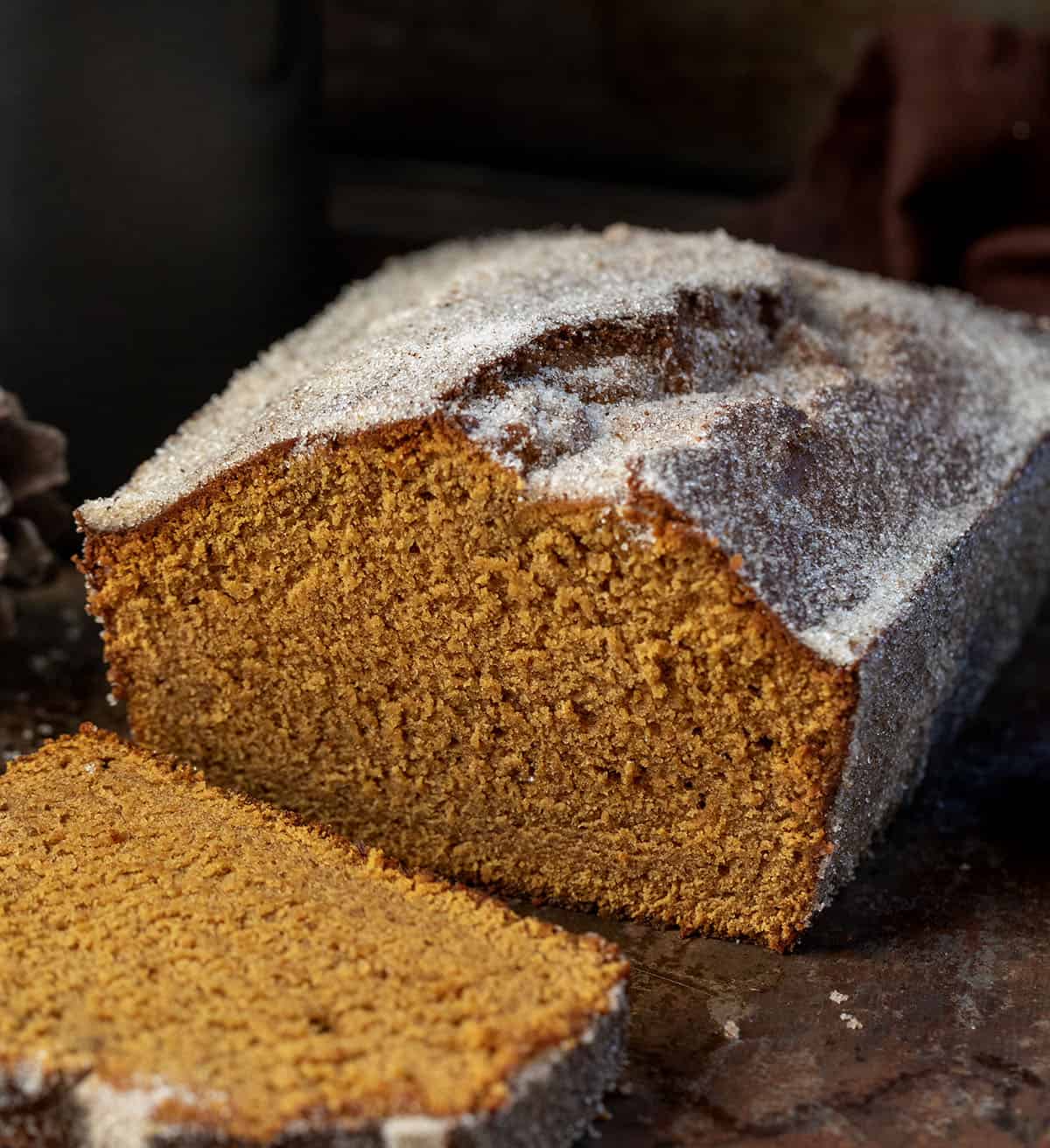 Loaf of Gingerbread Donut Bread that has been cut and has pieces laying flat Loaf of Gingerbread Donut Bread that has been cut and has pieces laying flat.