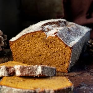 Loaf of Gingerbread Donut Bread that has been cut and has pieces laying flat.