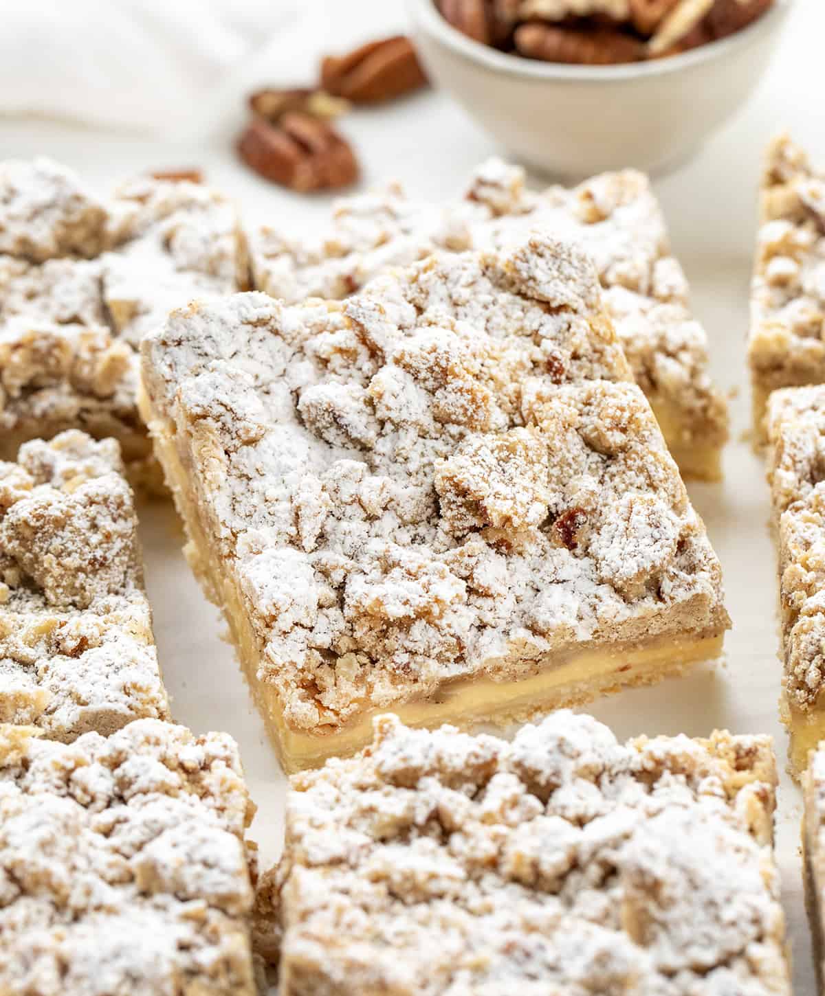 Close up of cut up Pecan Vanilla Cream Crumb Bars.