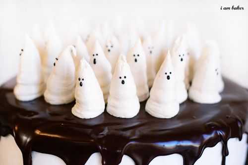 Boo-tiful Halloween cake topped with sweet ghosts